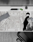40x20 inches grayscale anime desk pad, calm noir city vibe with airy backdrop and bold shaded characters.