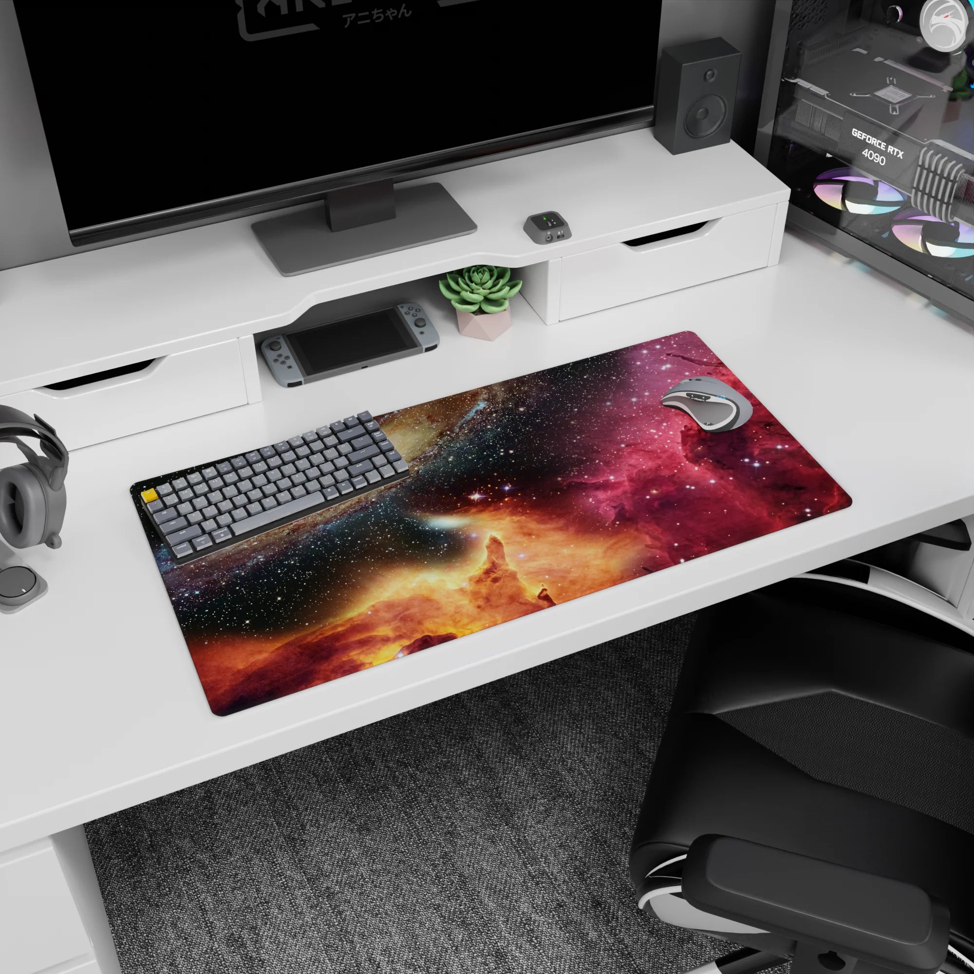 Spiral galaxy hovering over a star-speckled sky mouse pad, 32x16 inches, with glowing nebula scene.