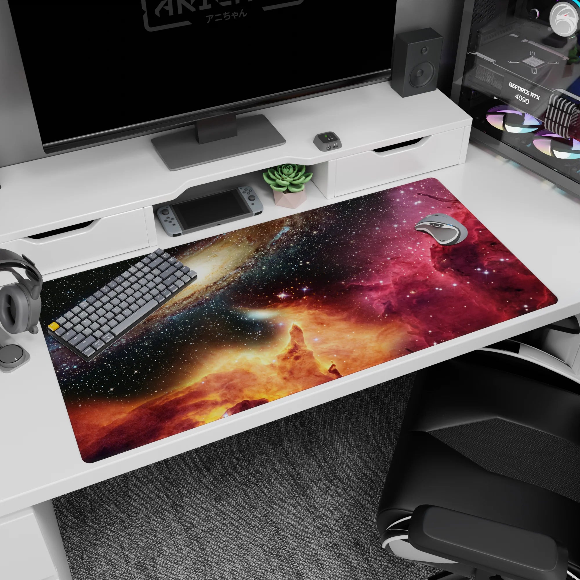 Spiral galaxy scene desk pad 40x20 inches, star-speckled sky with magenta nebula and glowing horizon.