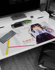 40x20 inches Saekano desk pad featuring Kasumigaoka Utaha shy pose, red eyes and flowing dark hair.