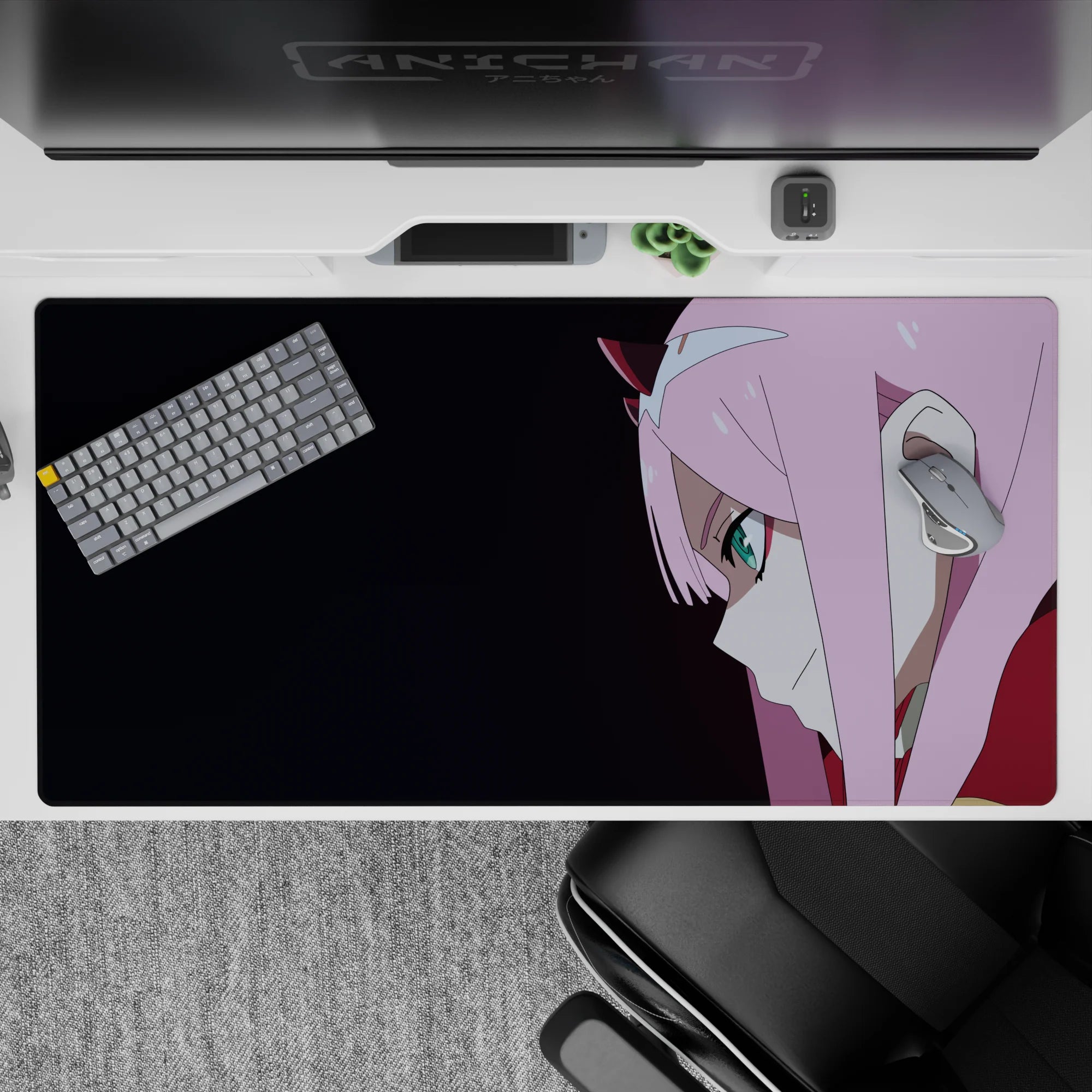 Sleek 40x20 desk pad with mysterious anime art, capturing piercing teal eyes and confident smirk against a dark backdrop