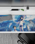 Pastel sky-blue glow anime desk pad 36x16 inches, sparkly highlights and carefree summer rain vibe.