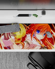 Molten red sunrise tones anime desk pad 36x16 inches, glowing streaks and golden magic for cute gaming setup.
