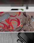Cozy-danger anime desk pad 40x20 inches in soft grays with crimson flames and orange spark highlights.