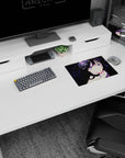 Dark-haired anime girl with purple galaxy eyes in black lace on mouse pad 14x10 inches beside crystals.
