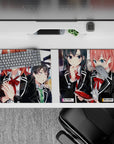 Anime girl desk pad 36x16 inches in black, warm skin tones and glossy red accents with soft hallway blur.