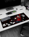 36x16 inches Kakegurui desk pad featuring Yumeko Jabami reaching out with a daring grin and flying cards.