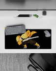 Zenitsu anime mouse pad, 28x12 inches, showcasing Zenitsu Agatsuma in a fierce stance with his orange haori and sword.