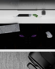 36x16 inches anime desk pad in deep blacks with cold violet Rinnegan glow, moody late-night aesthetic.