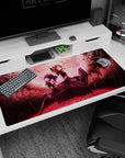 Gothic anime duo on a coffin with rose petals on a 40x20 inches desk pad, haunted cute vibe.