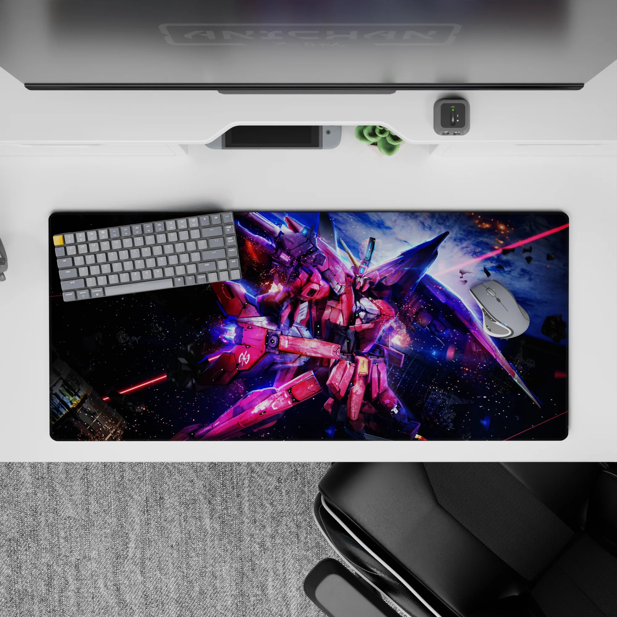 36x16 inches desk pad in pink and crimson with neon blue glow, fast sci-fi vibe and cosmic sparks.