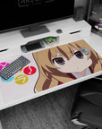 40x20 inches Toradora mouse pad featuring Taiga Aisaka pouting in a red uniform with sparkly eyes.