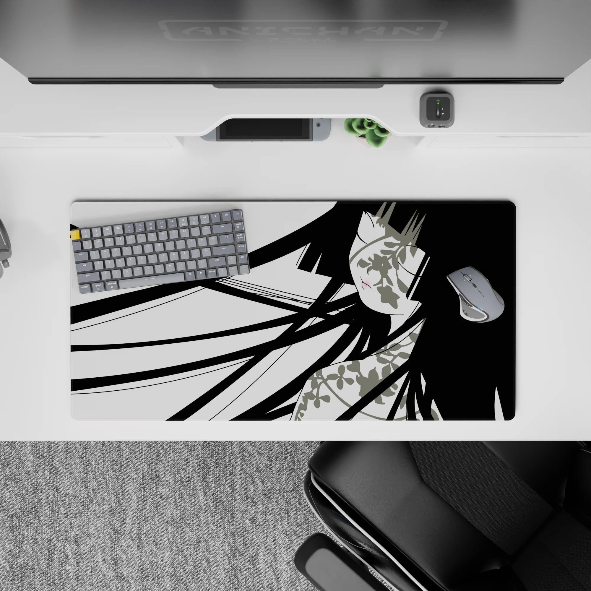Black-and-white anime girl mouse pad with soft blush and floral accents, 32x16 inches.