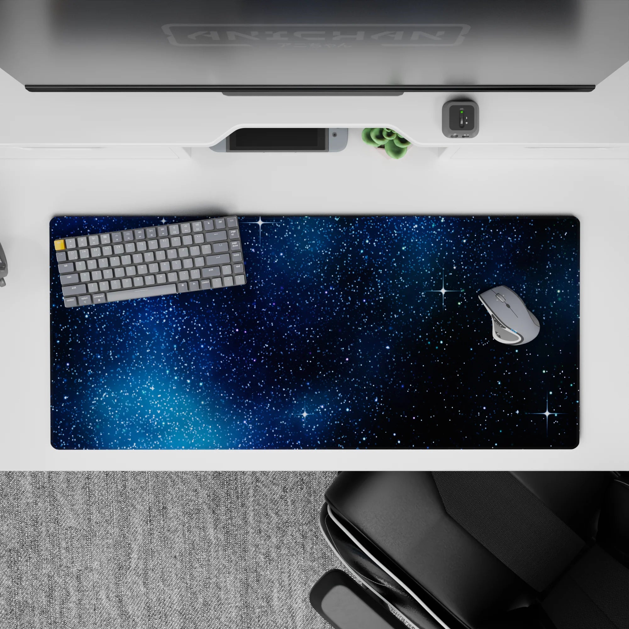 Navy-to-black cosmic gradient desk pad, 36x16 inches, calm and dreamy with tiny sparkling starbursts.
