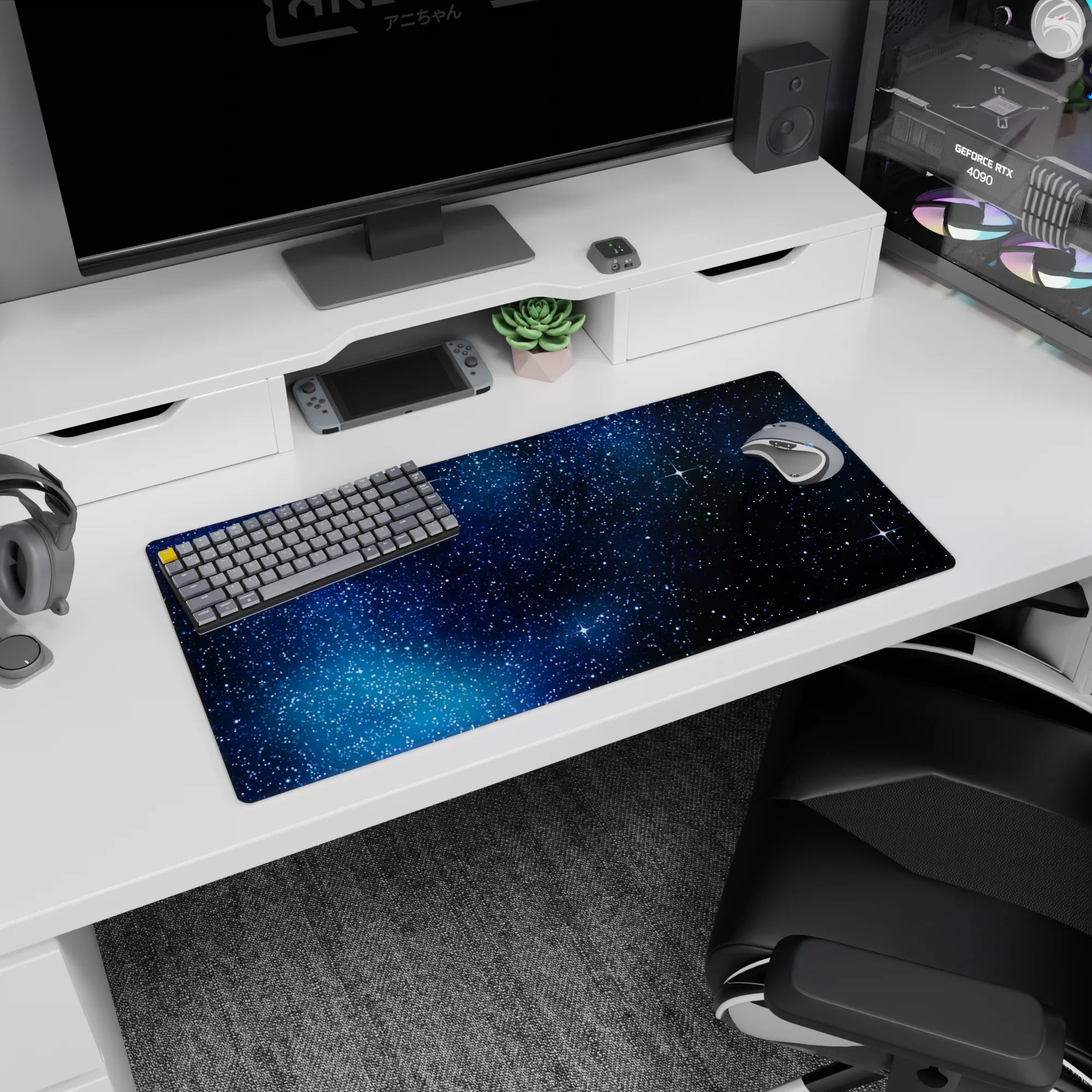 Space scene mouse pad, 32x16 inches, featuring bright starbursts and tiny sparkles across a dark sky.