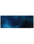 Midnight sky starfield desk mouse pad, extended 32x12 inches with nebula mist and sparkles.