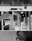 Moody black-and-white anime girl desk pad 40x20 inches, high-contrast late-night slice-of-life vibe.