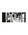 28x12 inches anime girl mouse pad with manga line art, shy girl in hallway, laundry basket scene.
