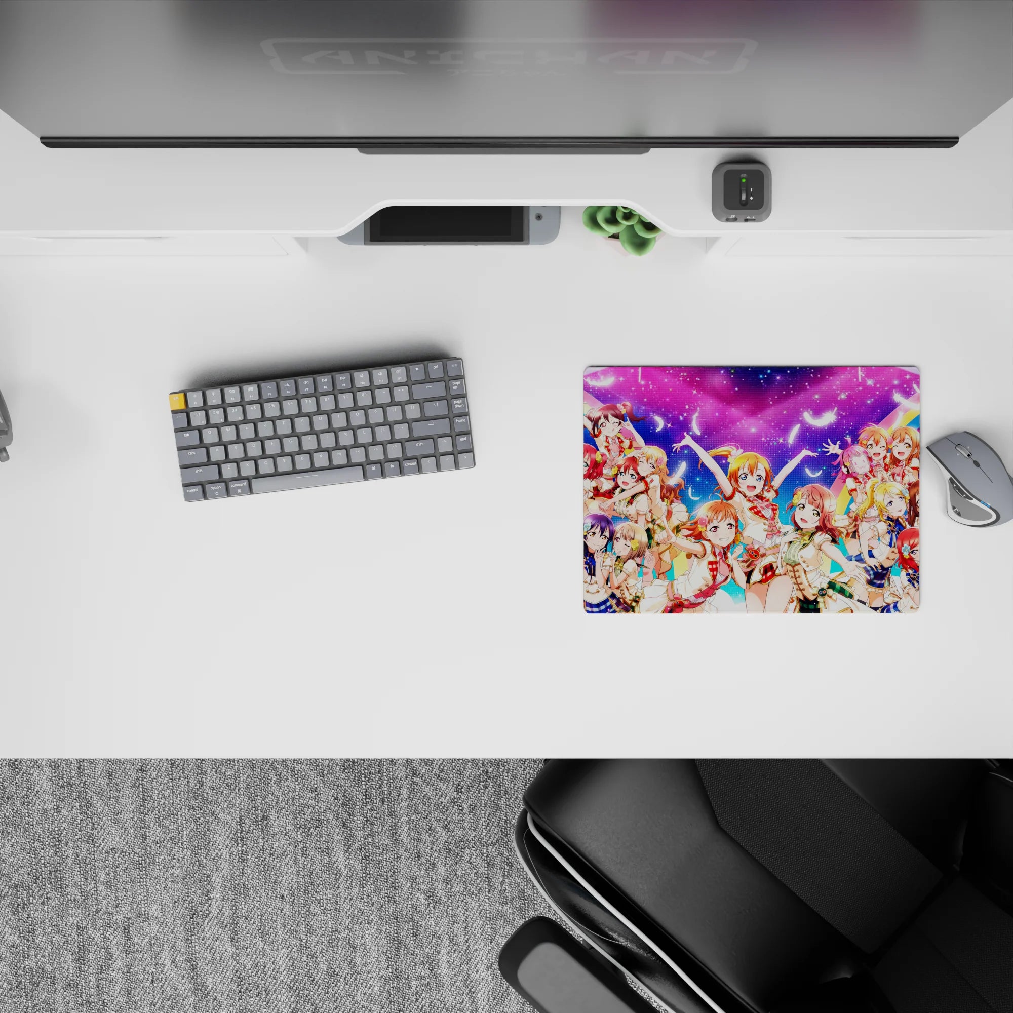 Neon pink and candy blue anime girl mouse pad 14x10 inches with rainbow arcs and bright idol vibes.
