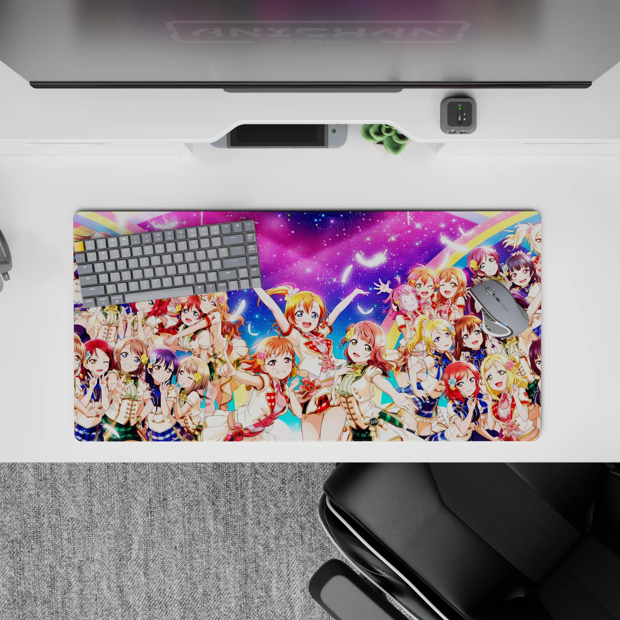 Neon pink and candy blue rainbow anime girl mouse pad with feather accents, 32x16 inches.