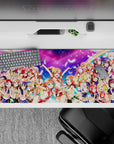Neon pink and candy blue anime girl desk pad with rainbow arcs and bright happy vibe, 36x16 inches.