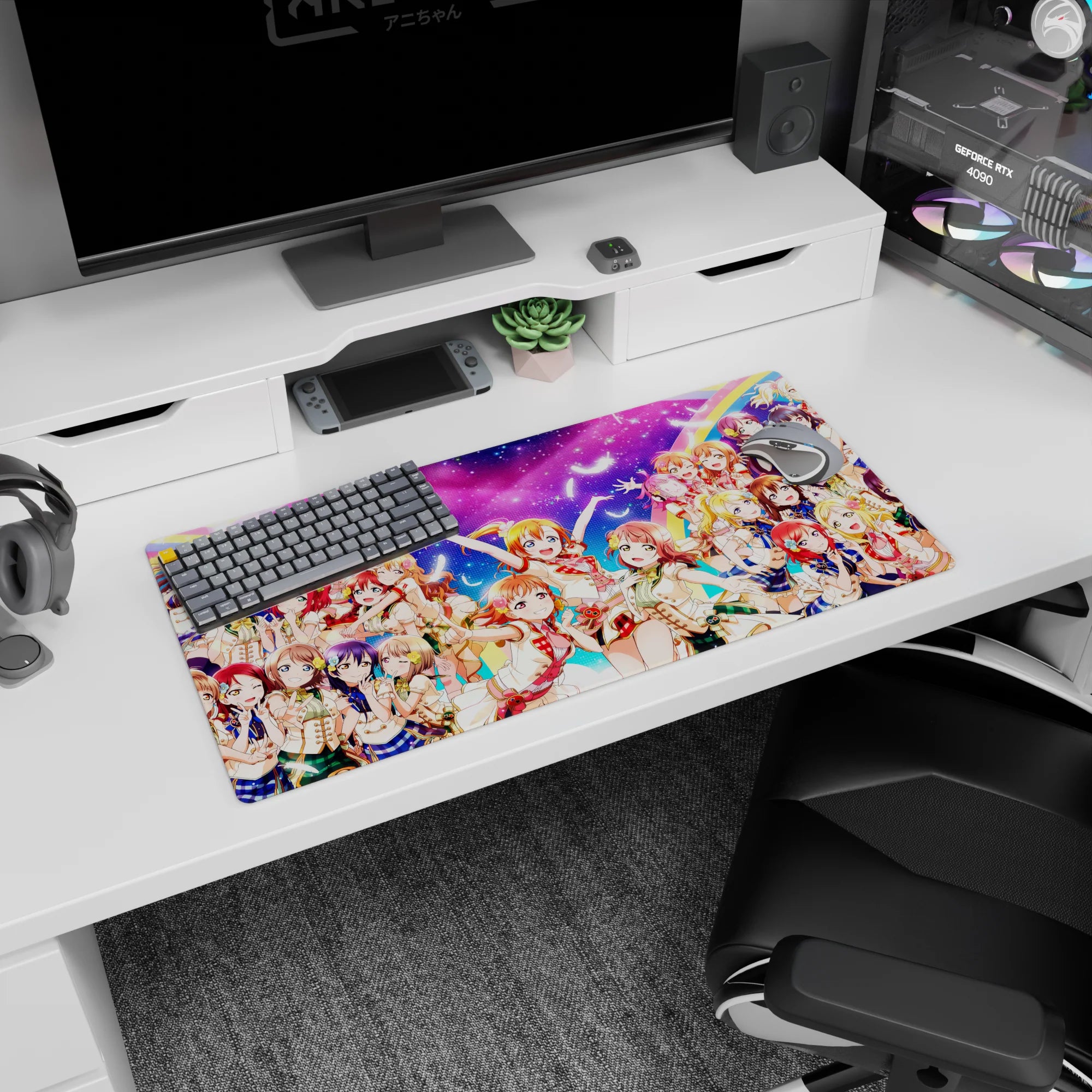 Honoka Kousaka, Kotori Minami, and Umi Sonoda smiling on anime girl mouse pad, 32x16 inches.