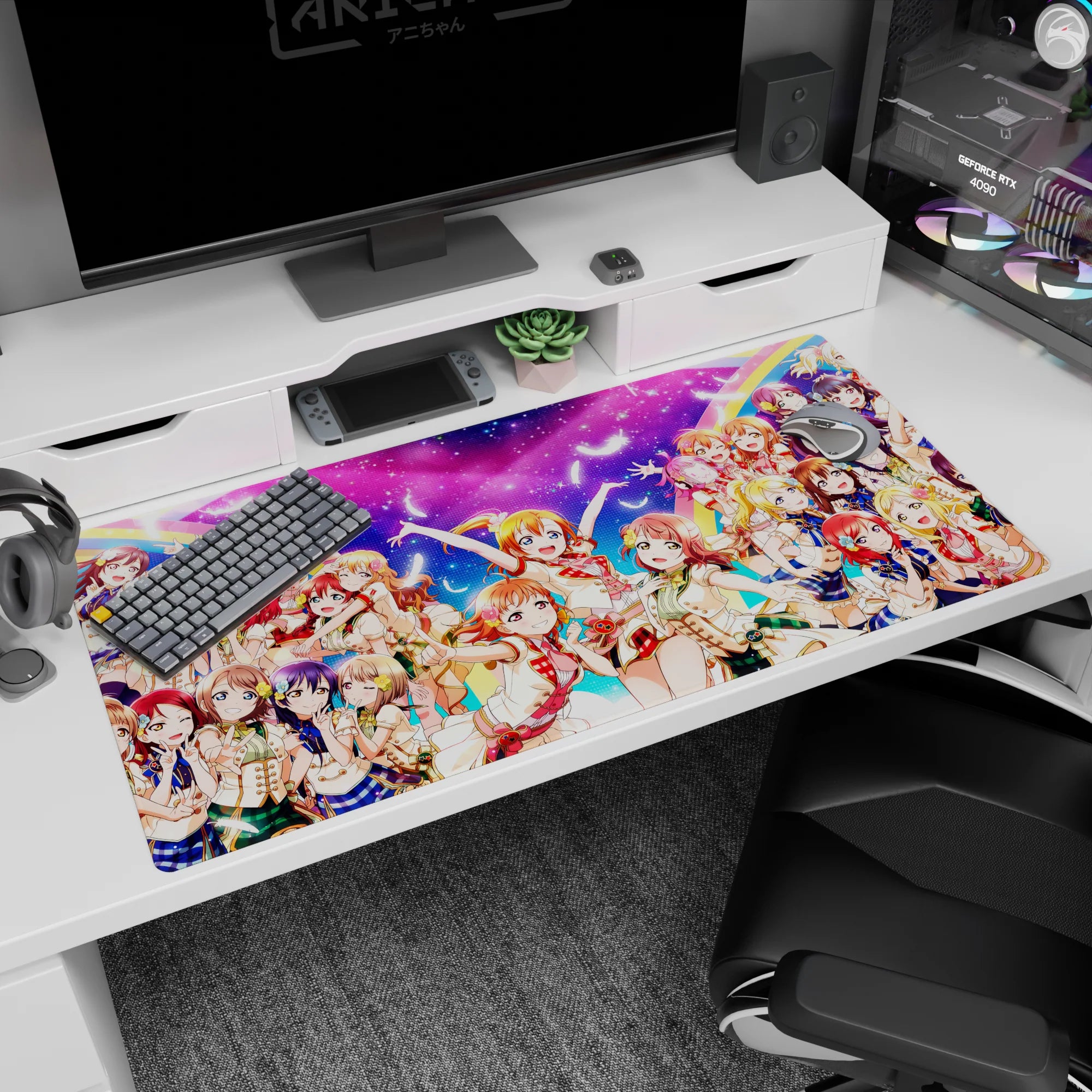 Honoka Kousaka, Kotori Minami, and Umi Sonoda smiling on anime girl desk pad, 40x20 inches.