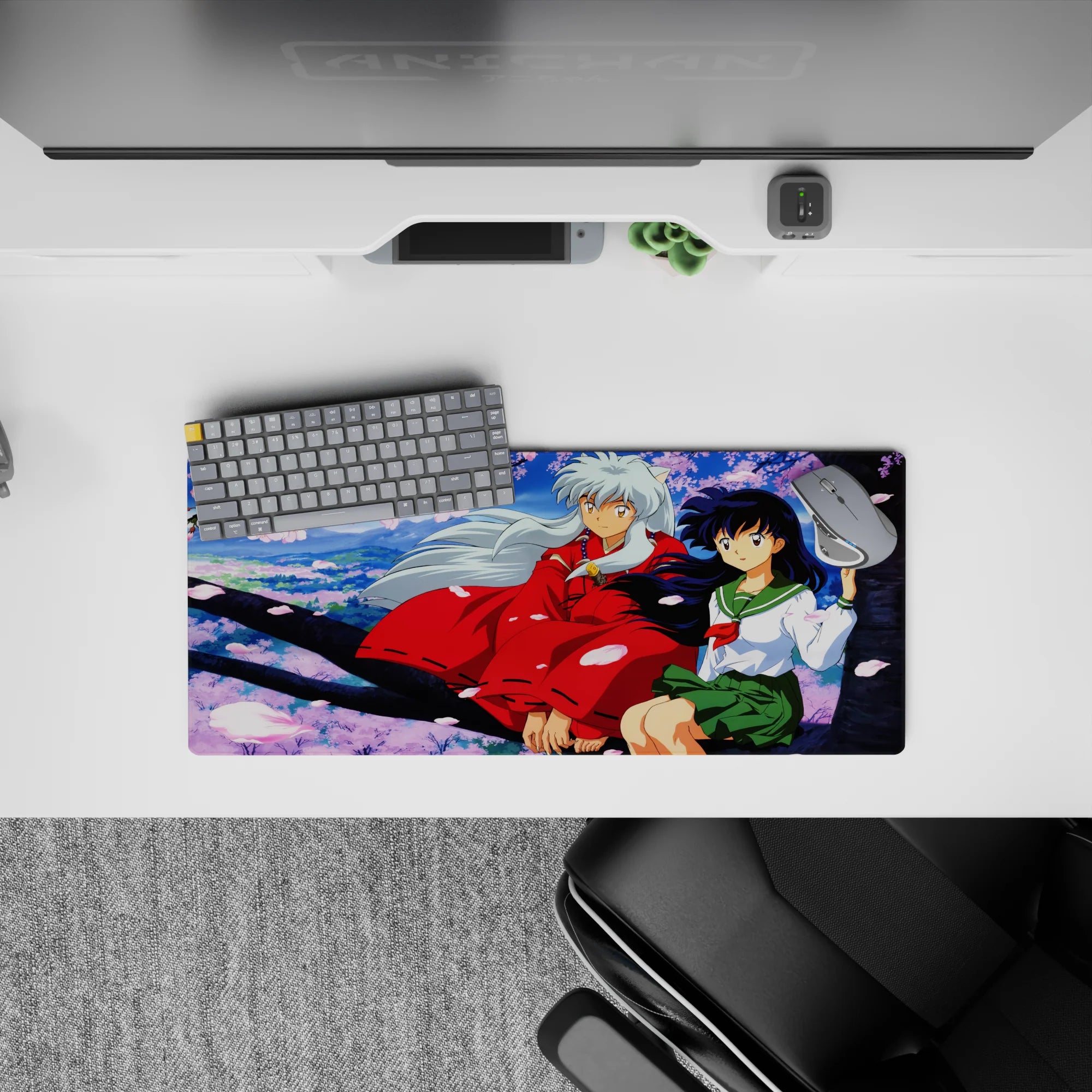 28x12 inches anime mouse pad in soft sky blues and pink sakura petals, calm romantic desk aesthetic.