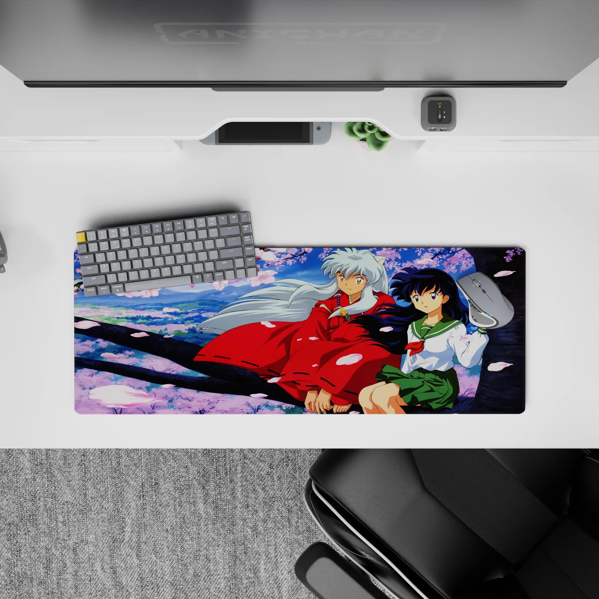 32x12 inches anime mouse pad in pastel sky blues and pink sakura petals, soft romantic desk aesthetic.