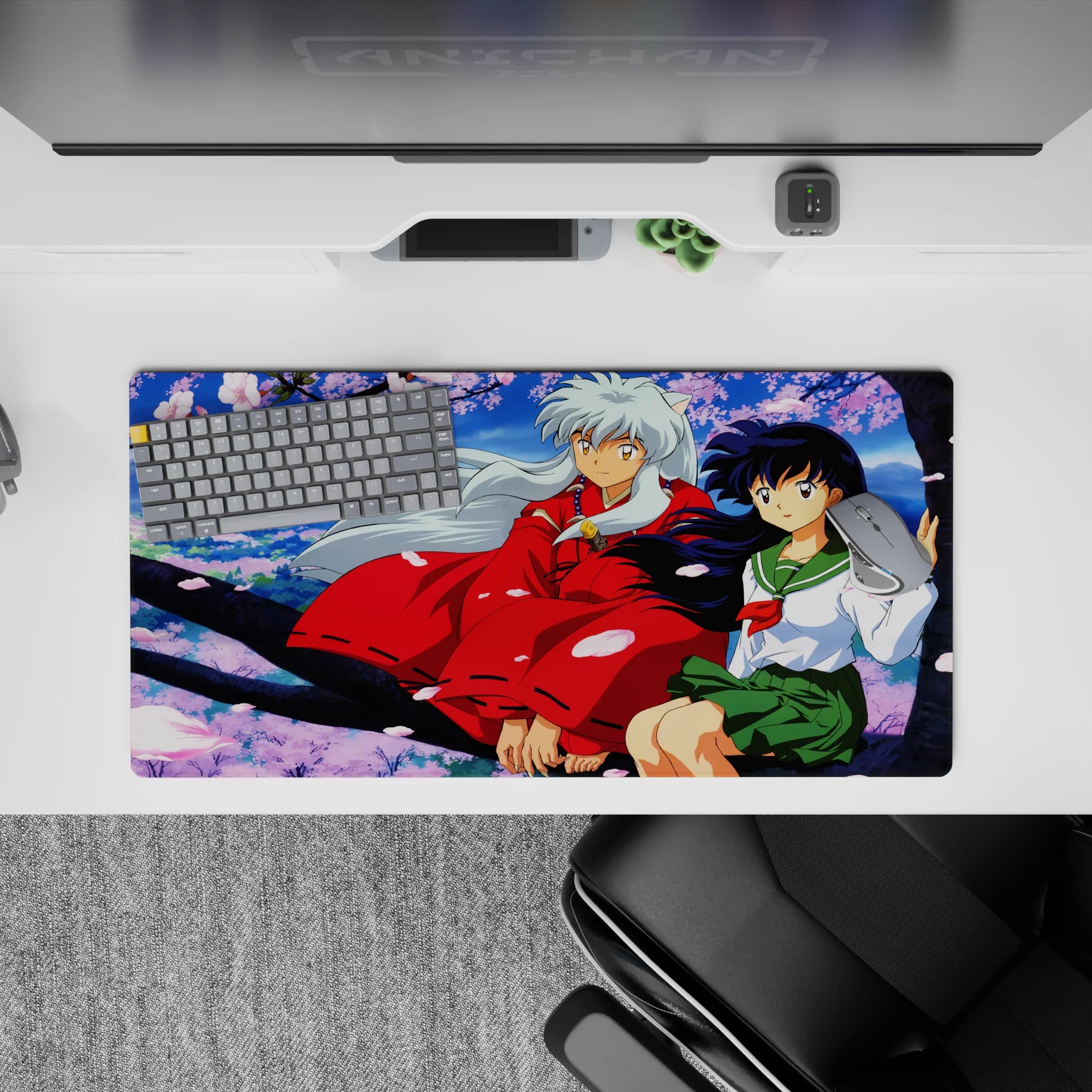 32x16 inches anime mouse pad in soft sky blues and pink sakura petals, calm romantic desk aesthetic.