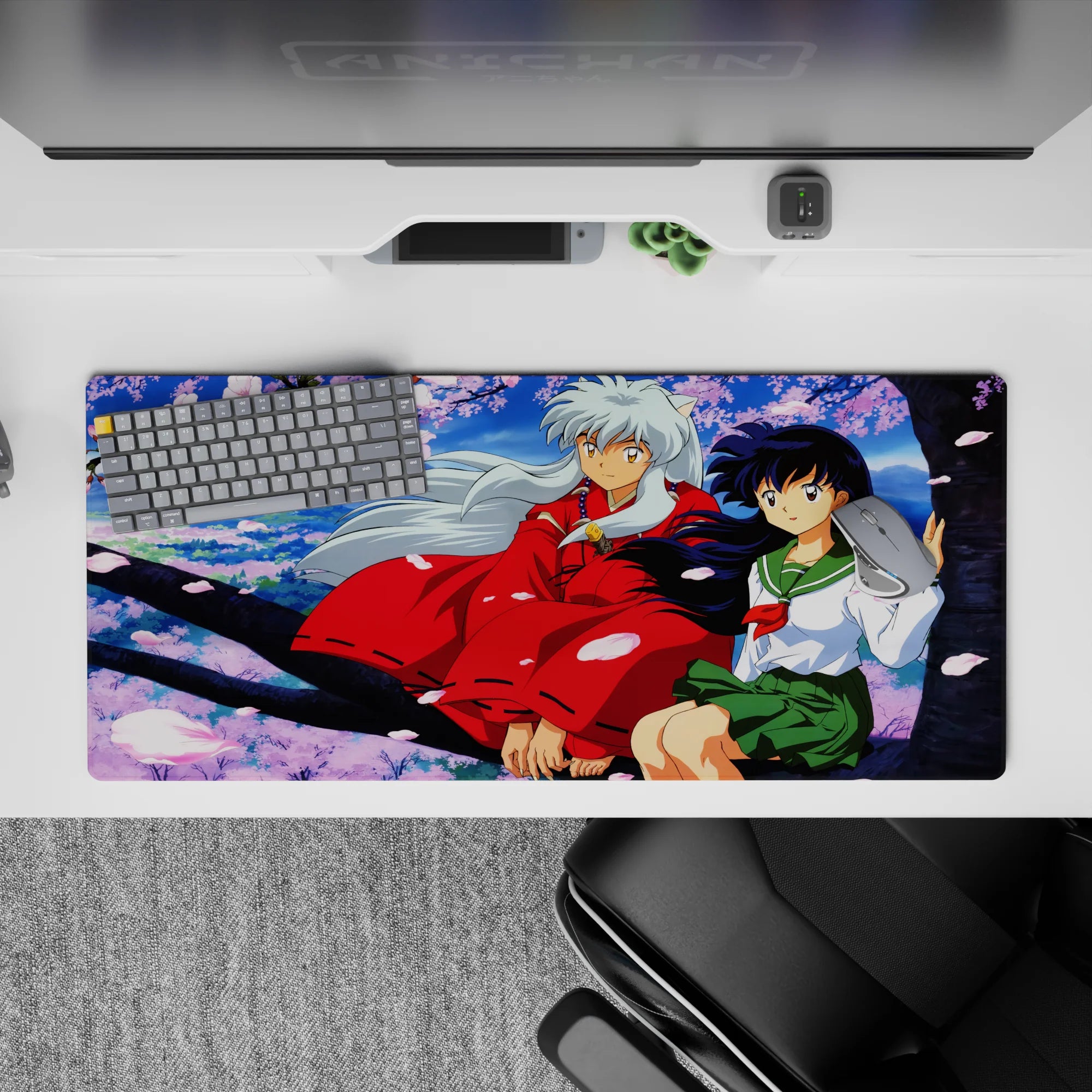 36x16 inches anime desk pad in soft sky blues and pink sakura petals, calm romantic vibe for fans.