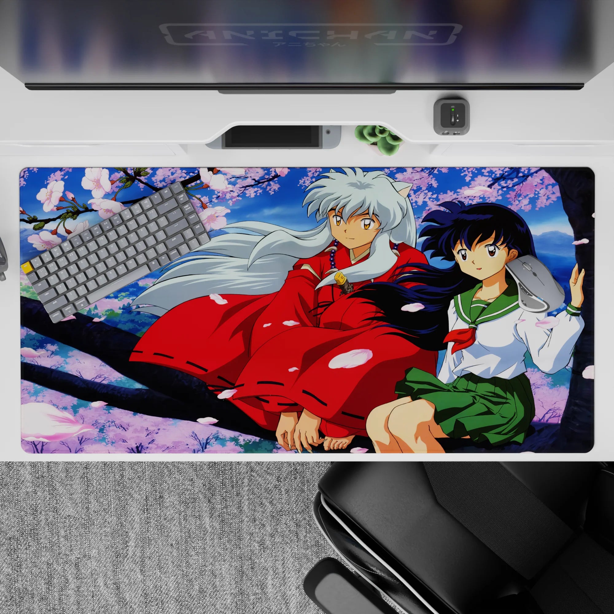 40x20 inches anime desk pad in soft sky blues and pink sakura petals, calm romantic vibe.