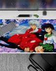 40x20 inches anime desk pad in soft sky blues and pink sakura petals, calm romantic vibe.