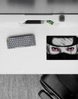 Anime mouse pad 14x10 inches in deep black and cool grey with a red Sharingan glow, calm and intense mood.