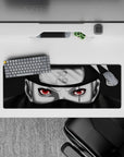 32x12 inches anime mouse pad in deep blacks and cool greys with a red Sharingan glow, sleek and intense.