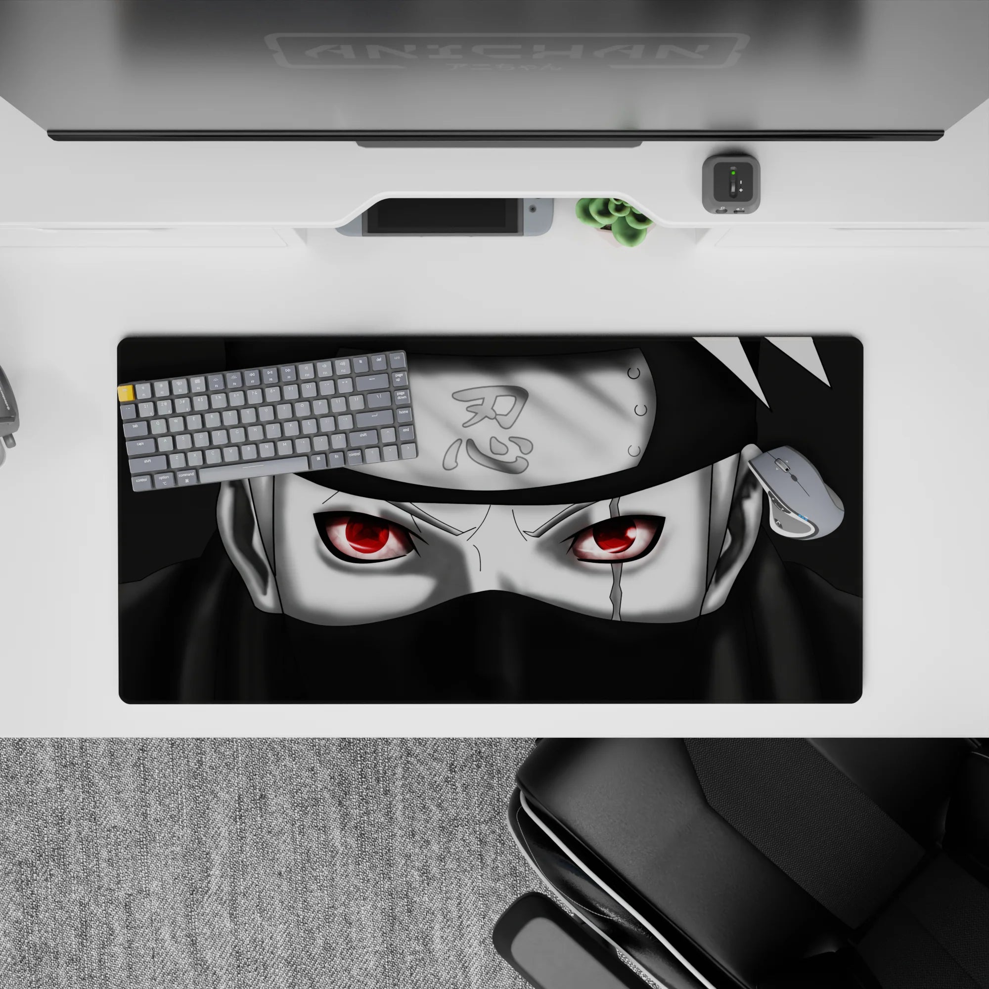 32x16 inches anime mouse pad in deep black and cool grey with a red Sharingan glow, calm intense mood.