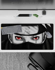 32x16 inches anime mouse pad in deep black and cool grey with a red Sharingan glow, calm intense mood.