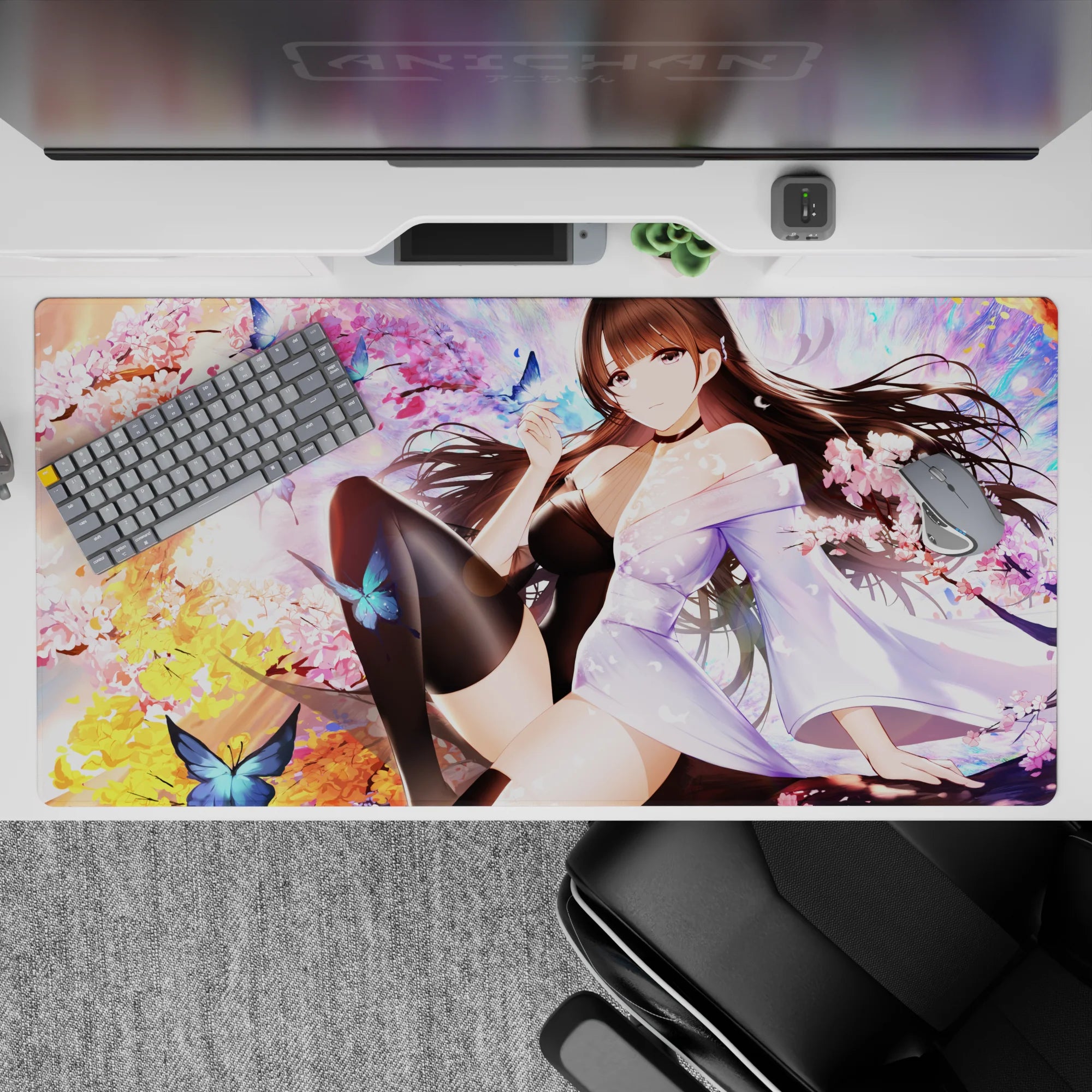 Dreamy romance desk pad 40x20 inches in cherry blossom pink and sunset gold with fluttering blue butterflies.