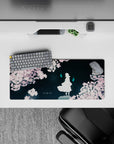 28x12 inches anime mouse pad in deep teal and soft pink, dreamy late-night vibe with glowing cyan accents.