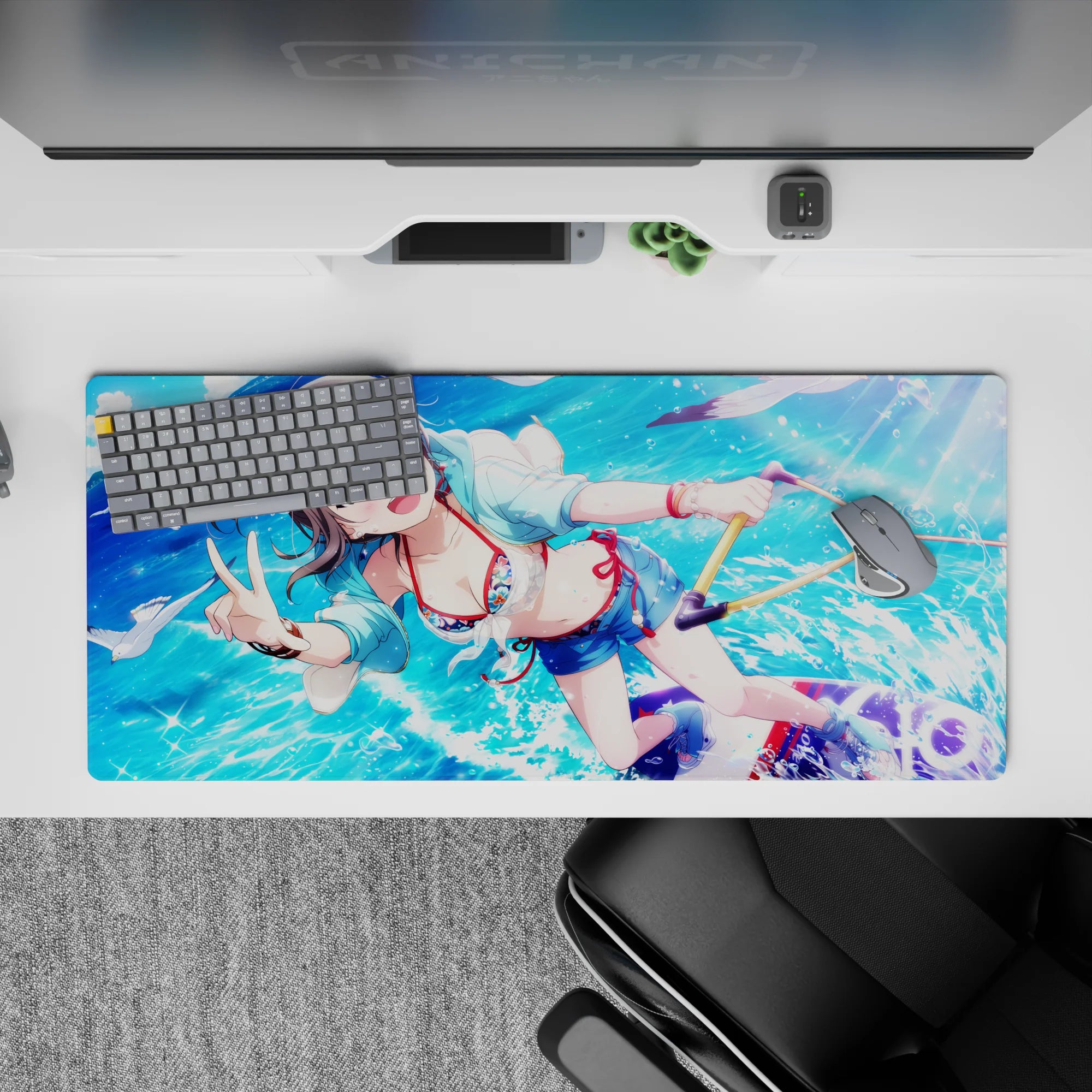 36x16 inches anime girl desk pad in bright ocean blues with sparkling droplets, playful summer crush vibe.