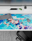 36x16 inches anime girl desk pad in bright ocean blues with sparkling droplets, playful summer crush vibe.