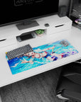 32x12 inches extended mouse pad showing cute anime girl with water droplets, beachy hoodie, playful V sign.