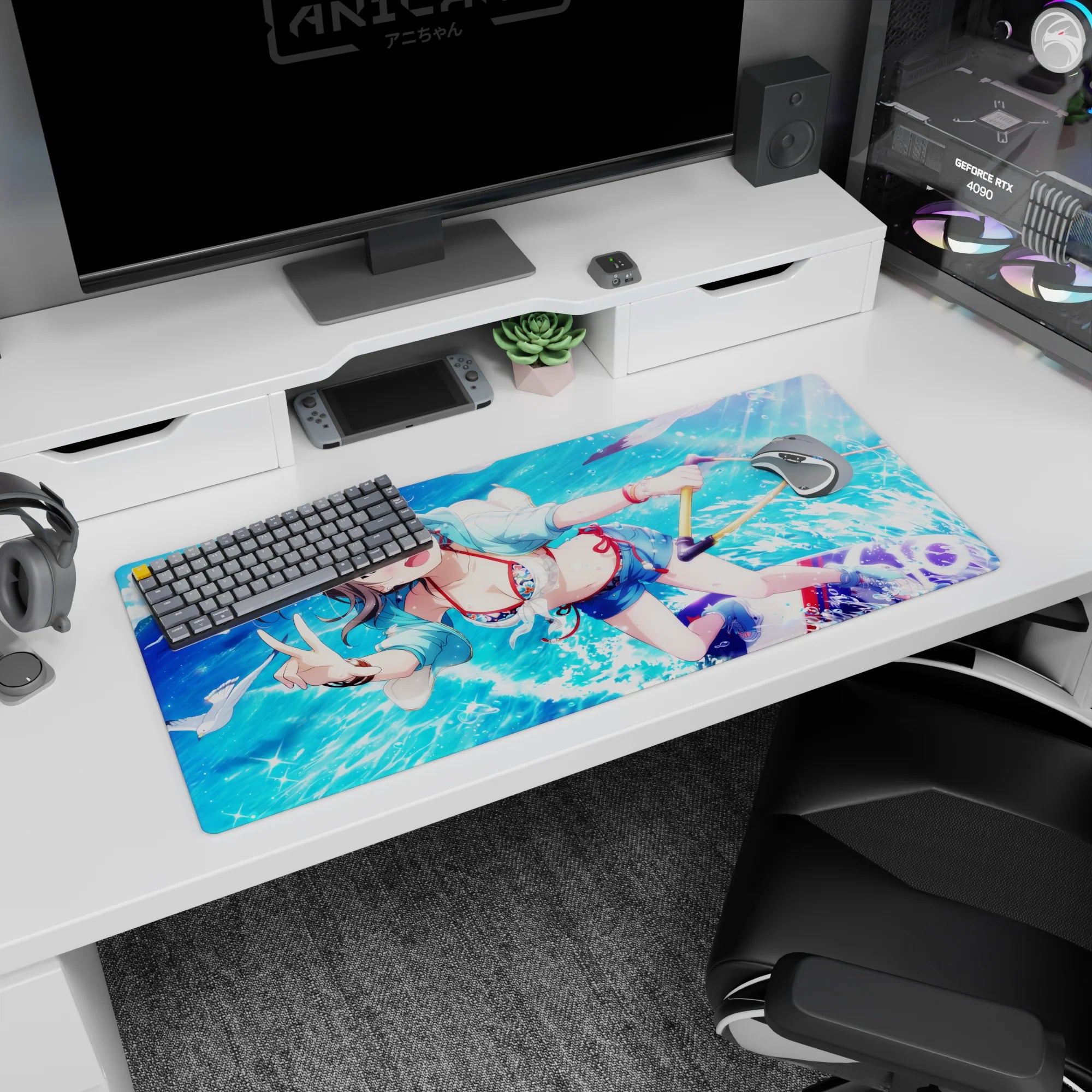 36x16 inches anime girl desk pad showing smiling girl in pastel hoodie flashing a peace sign by the sea.
