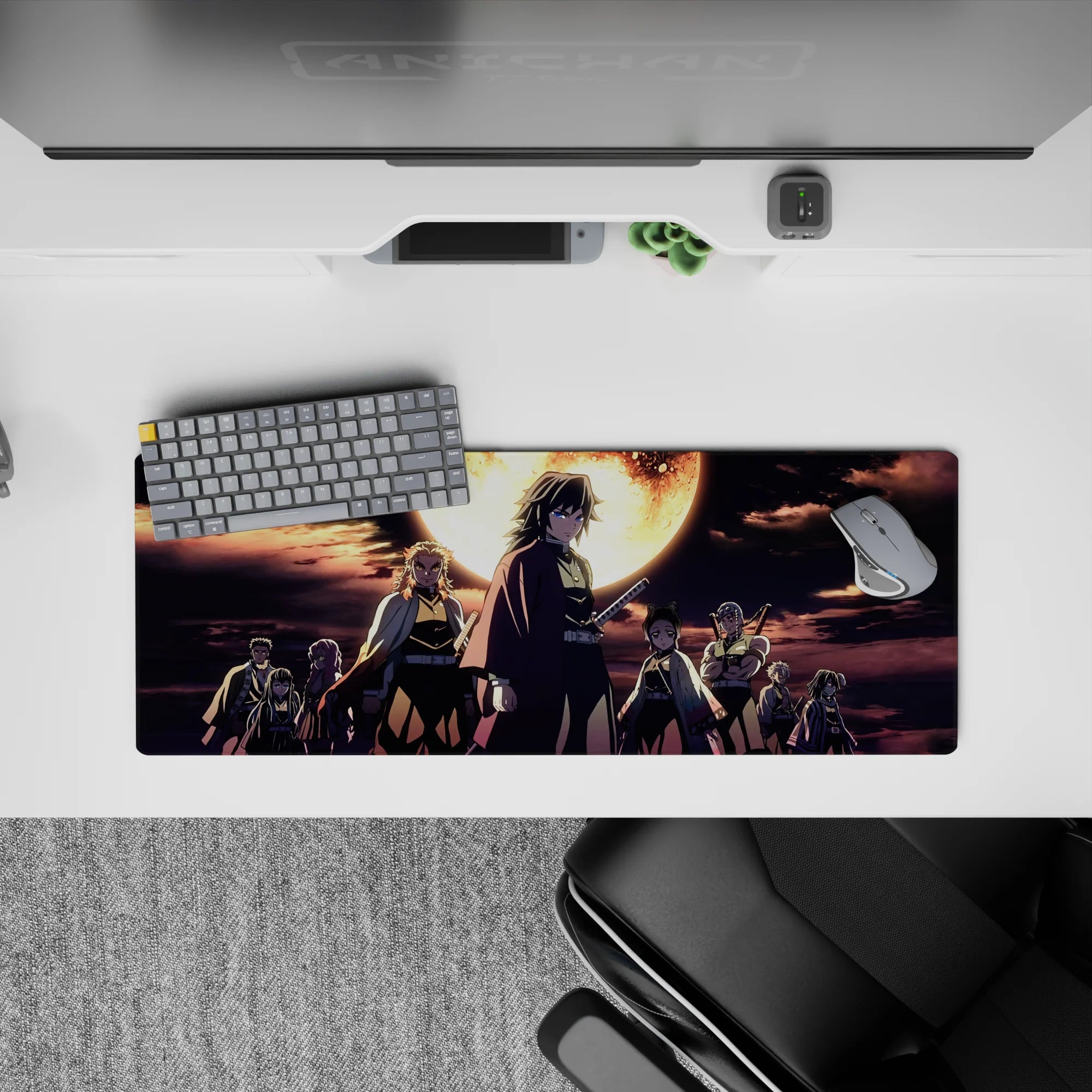 Anime mouse pad 32x12 inches featuring Demon Slayer Hashira under a burning moon, with deep blues and molten gold contrast.