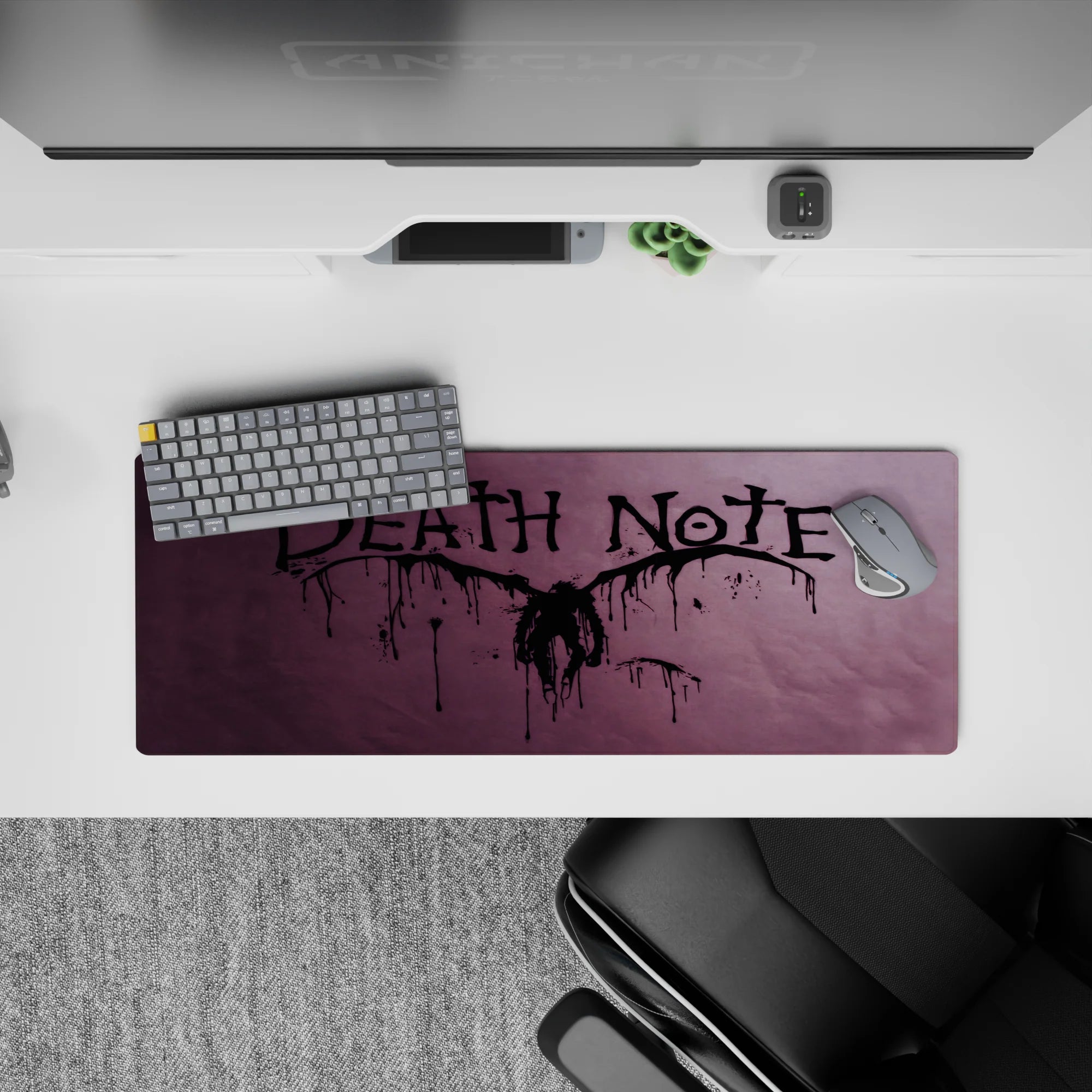 Dark purple smoky haze anime mouse pad 32x12 inches with dripping ink lettering for a moody desk setup.