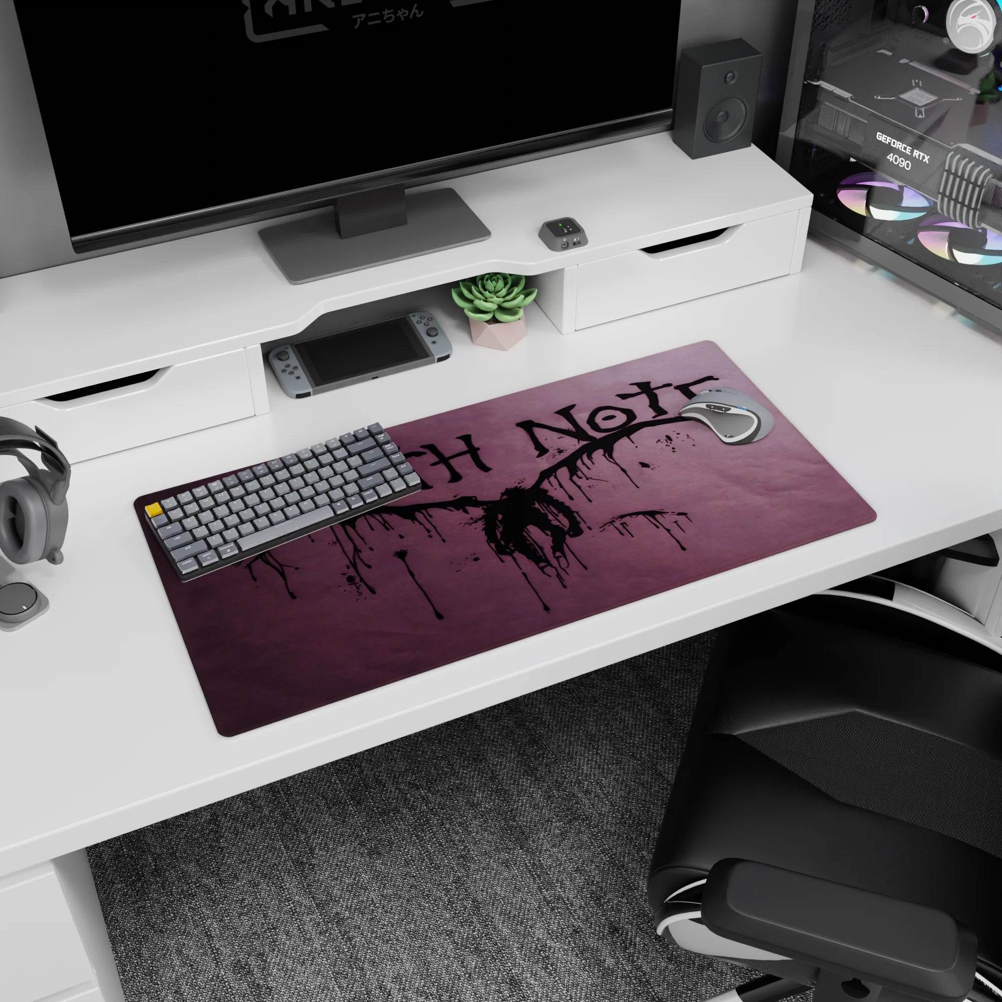 Winged shinigami silhouette centered with splatter lines on Death Note anime mouse pad 32x16 inches.