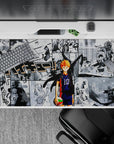40x20 inches anime desk pad in navy, orange, and high-contrast manga panels for a sweaty gym vibe.