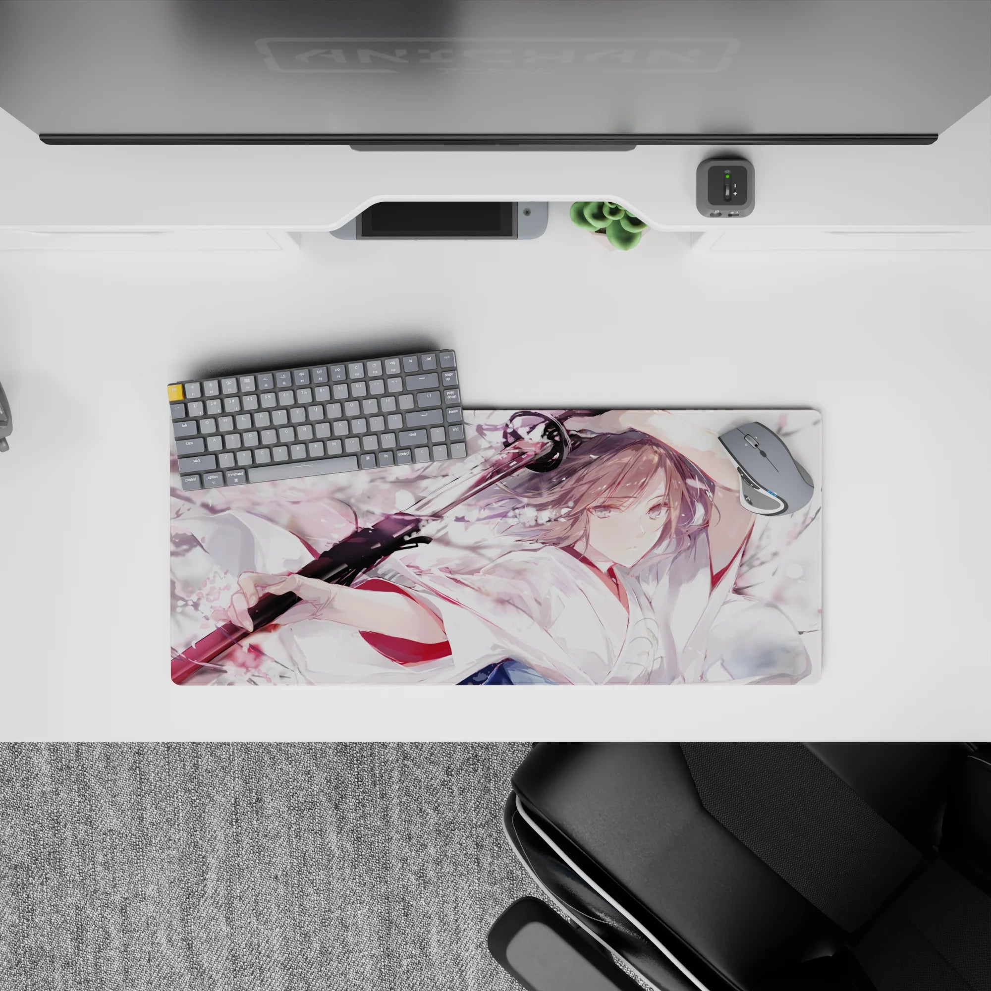 28x12 inches anime desk mouse pad in pale pink, milky white, smoky gray tones with bold black blade accents.