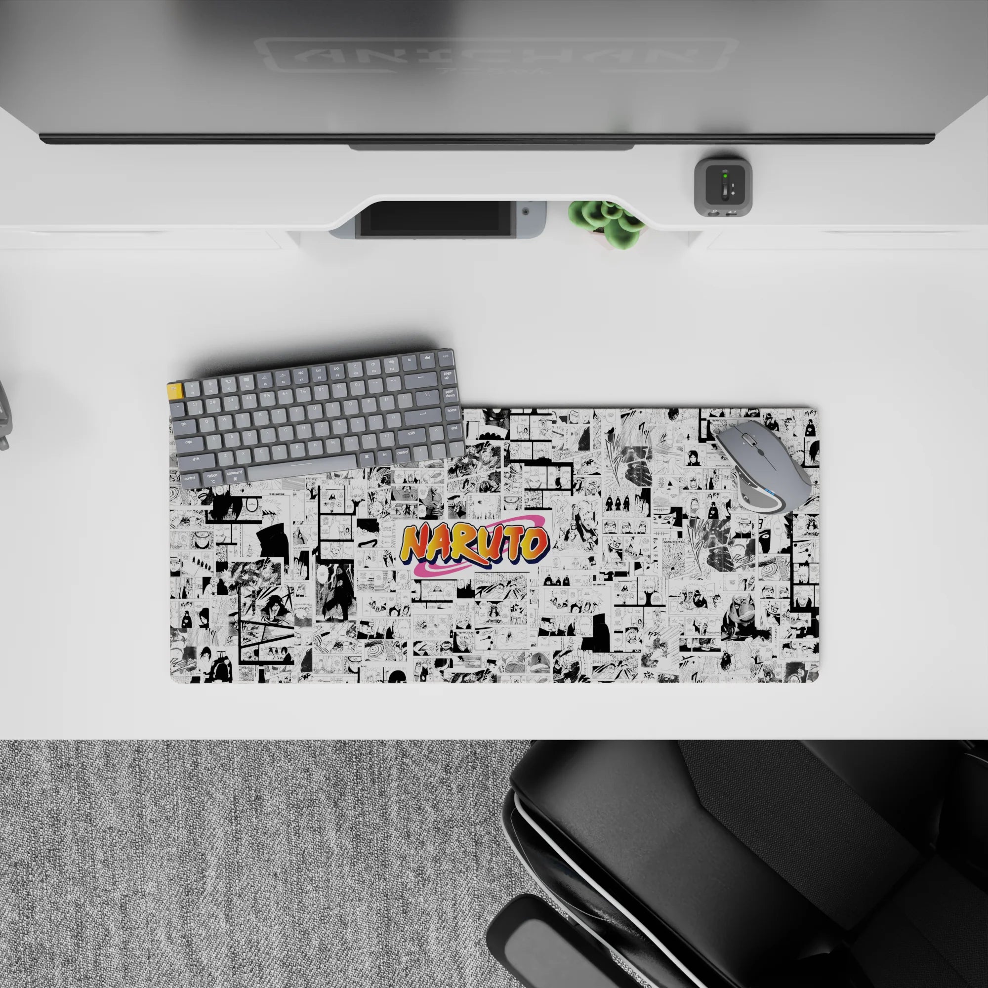 28x12 inches anime mouse pad with crisp monochrome manga art and bold orange Naruto logo vibe.