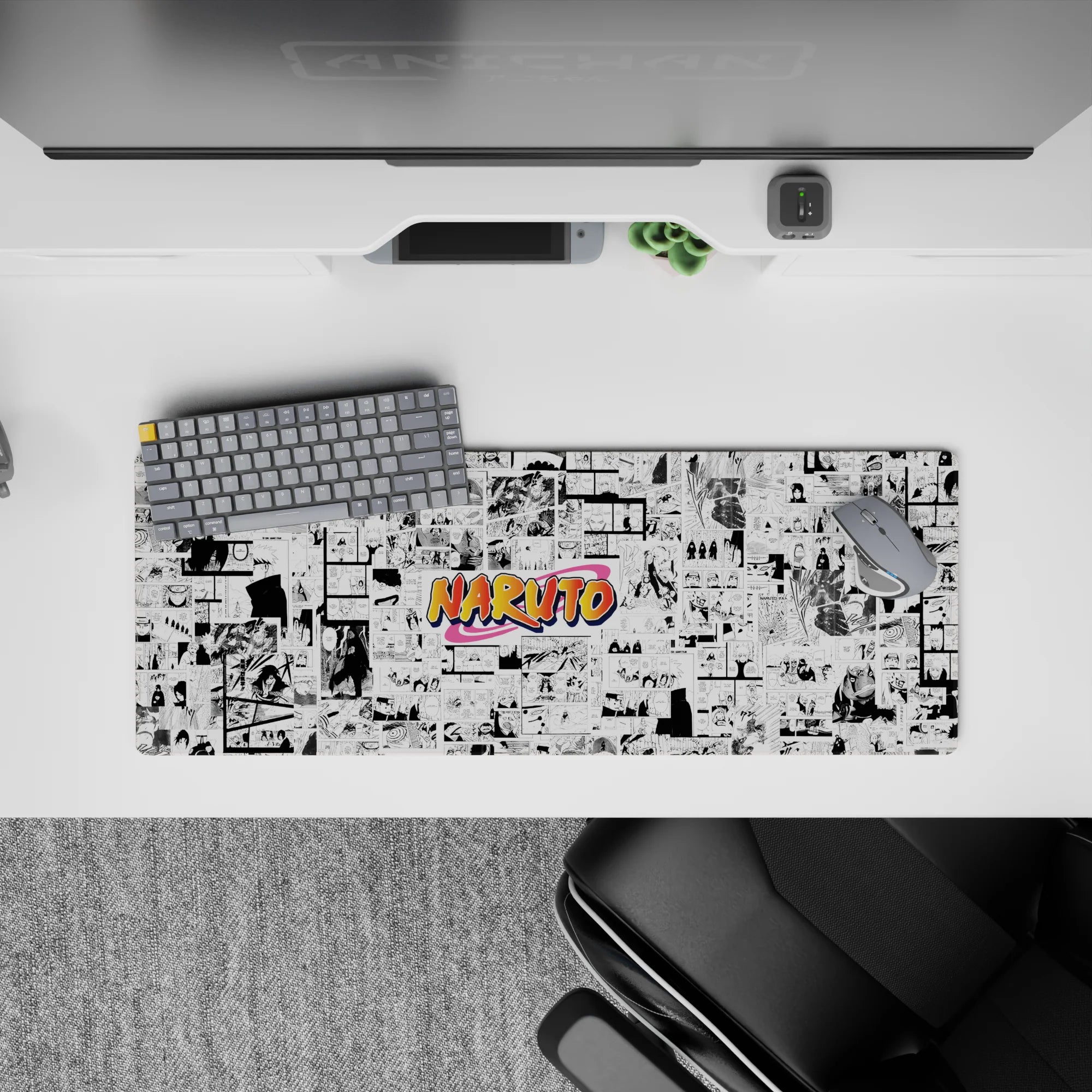 Crisp black-and-white anime panel mouse pad with bright orange pop and nostalgic shonen energy, 32x12 inches.